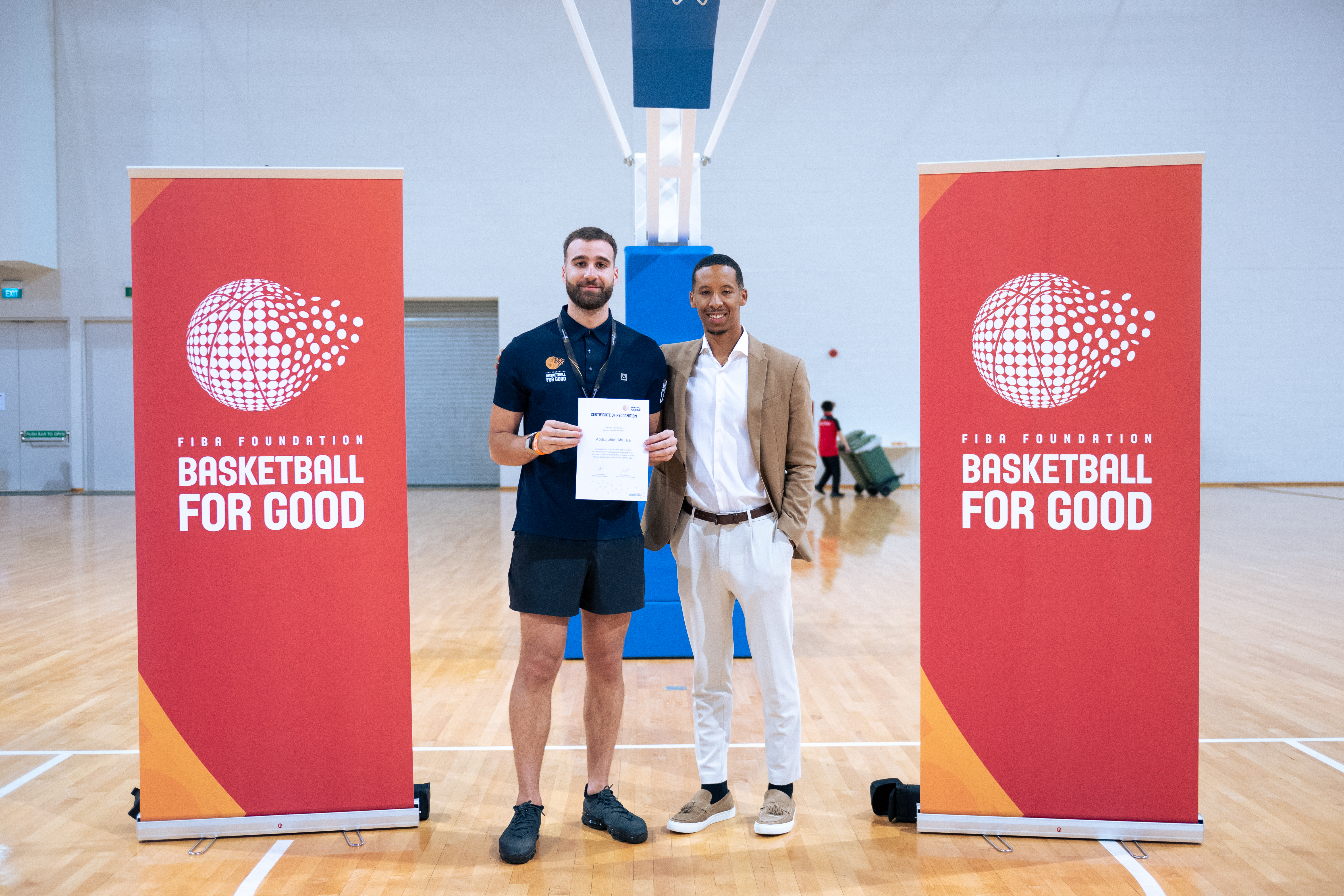 Abdulrahim Abuissa receiving his FIBA Foundation Youth Leader certificate